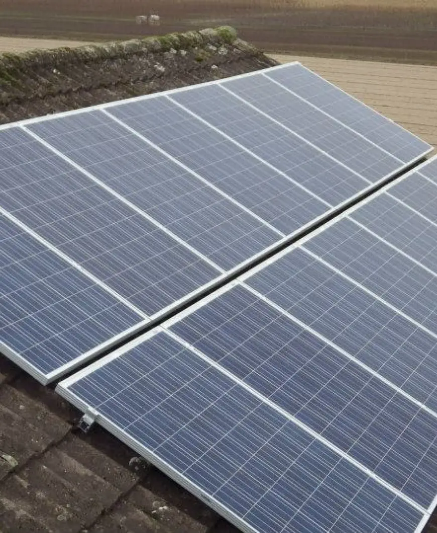 60 panelen op bedrijfsgebouw